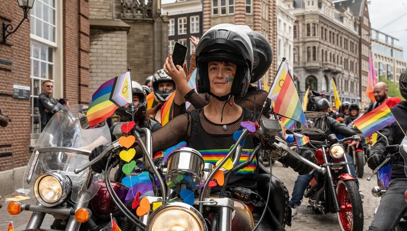 People on with rainbow colors decorated motorcycles during the Queer Walk 2023.
