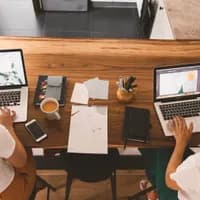 Two women working at desk