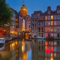 Amsterdam at night
126414503
Amsterdam Red Light District Armbrug at night with canal. Via Shutterstock