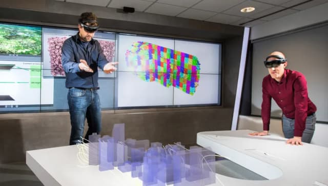Two men with virtual reality glasses
