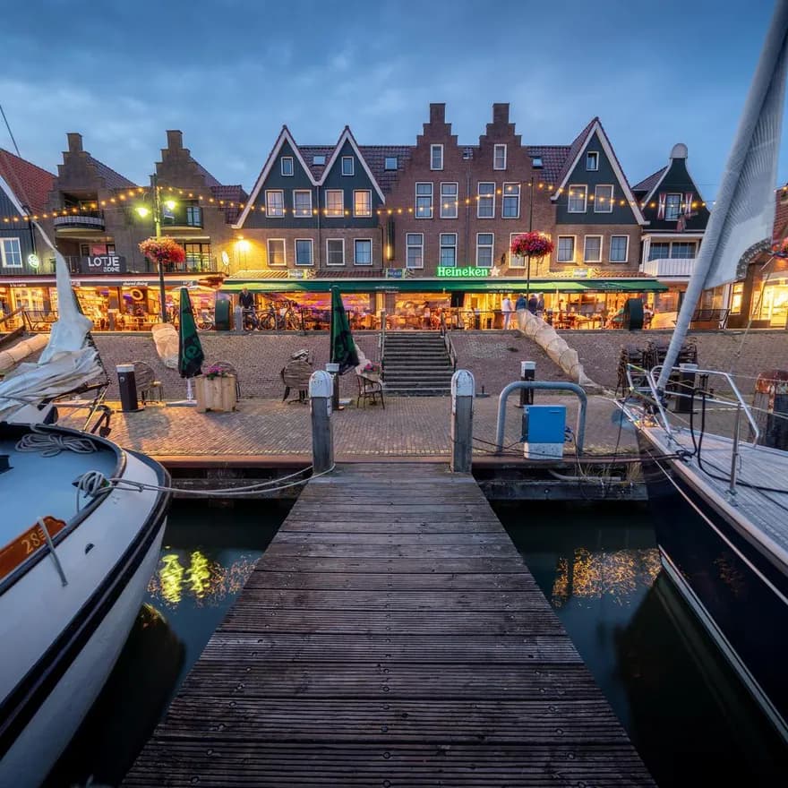 De Dijk at night in Volendam seen from the harbour.