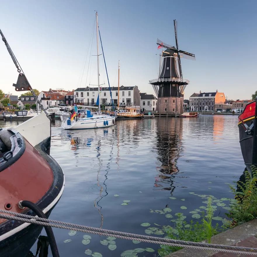Docked boats at the Molen de Adriaan Haarlem Lake