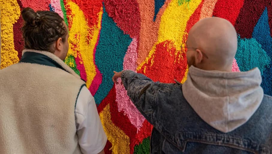 A couple visits OSCAM - Open Space Contemporary Art Museum.