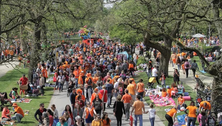 Koningsdag or King's Day is a national holiday in the Kingdom of the Netherlands. Celebrated on 27 April, the date marks the birth of King Willem-Alexander. 

Celebrations: Partying, wearing orange costumes, flea markets, concerts, and traditional local gatherings.