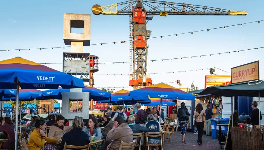 Over het IJ Festival 2019 people sitting in the food area