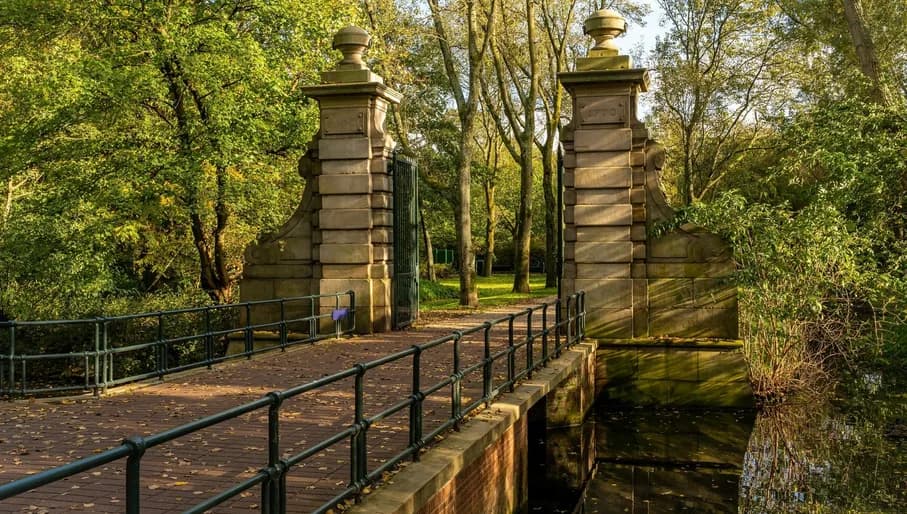 Entrance to Flevopark with light coming through the trees