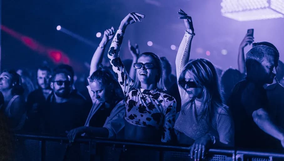 People dancing at DGTL Festival 2022.