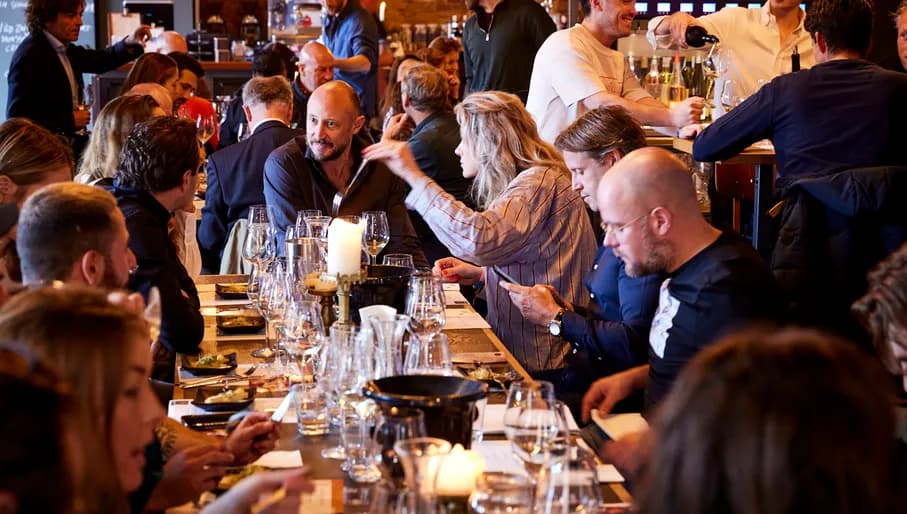 Diners drinking wine at Rayleigh & Ramsey