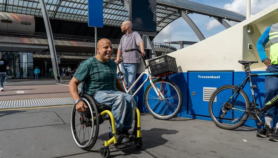 A person in a wheelchair taking the ferry at Central Station.
